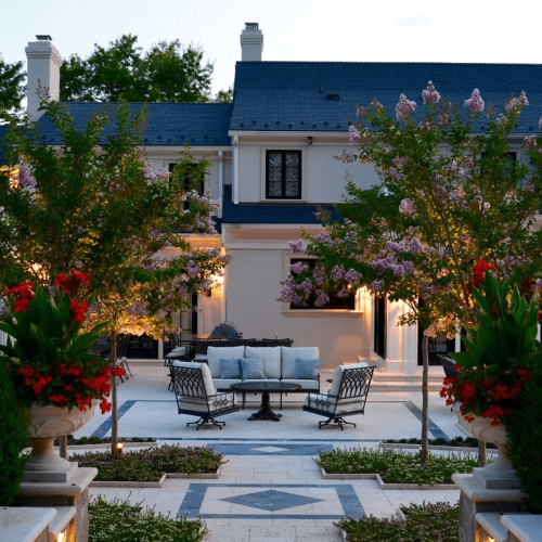 Image of custom stone patio in Potomac, Maryland designed by Capitol Hardscapes.